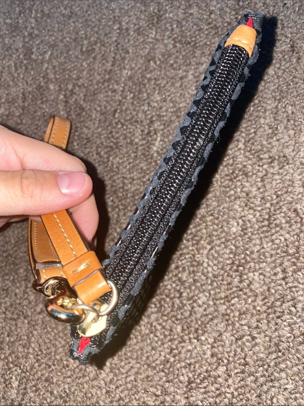 Dooney & Bourke Black Snake-Embossed Wristlet with Tan Trim